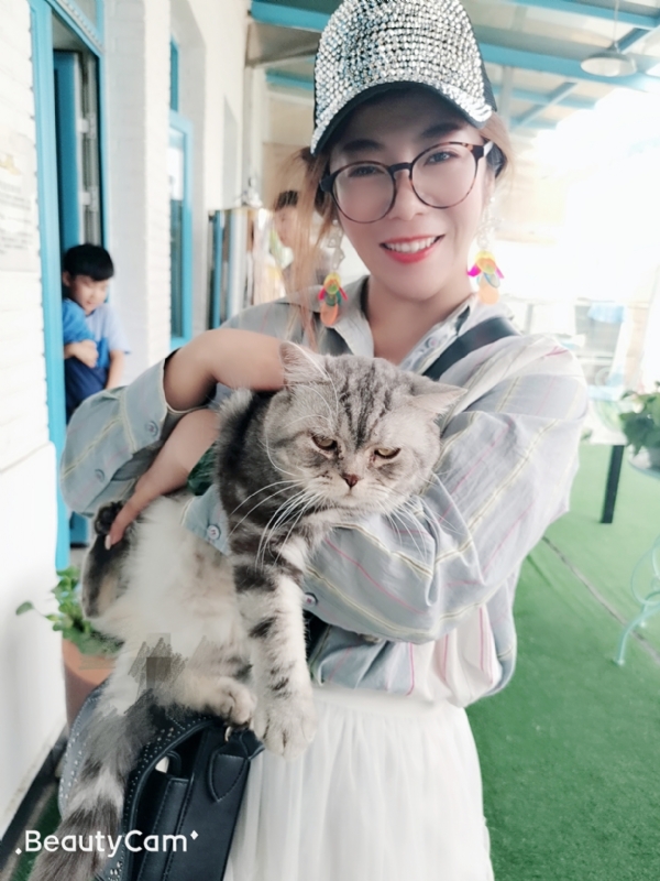 小黑猫的第一张照片--南通相亲服务中心